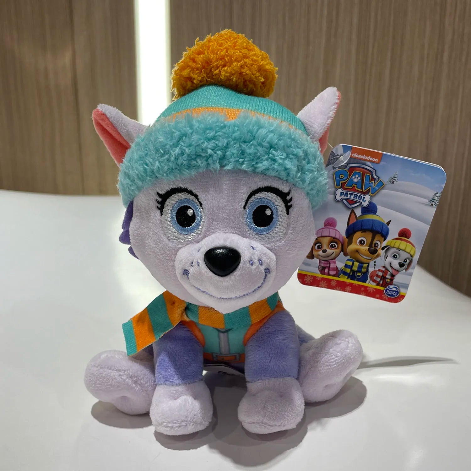 Original PAW Patrol Holiday Style Skye Chase Everest in scarf and hat. Officially licensed plush toy for ages 1 and up. 6 inches (15.2 cm).